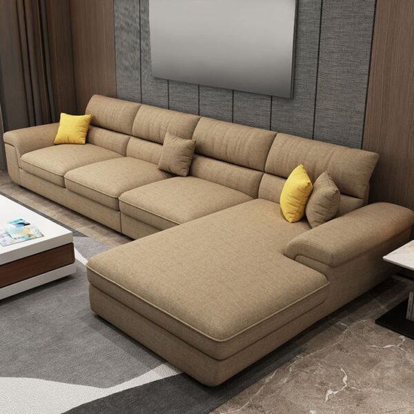 Comfortable fabric sofa with plush cushions and a modern design, placed in a cozy living room with a soft rug, decorative pillows,